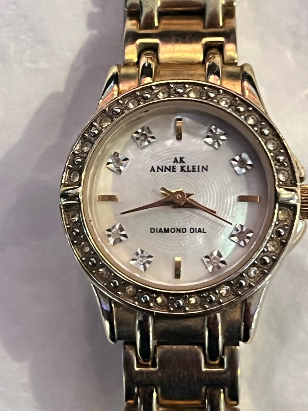Anne Klein Gold-Tone Crystal Bezel Mother-of-Pearl Dial Watch
